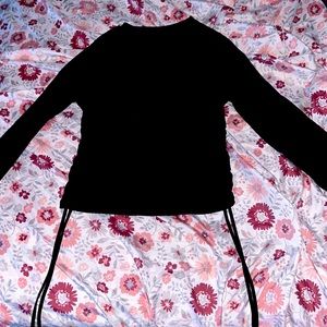 Black top with draw string on the side
